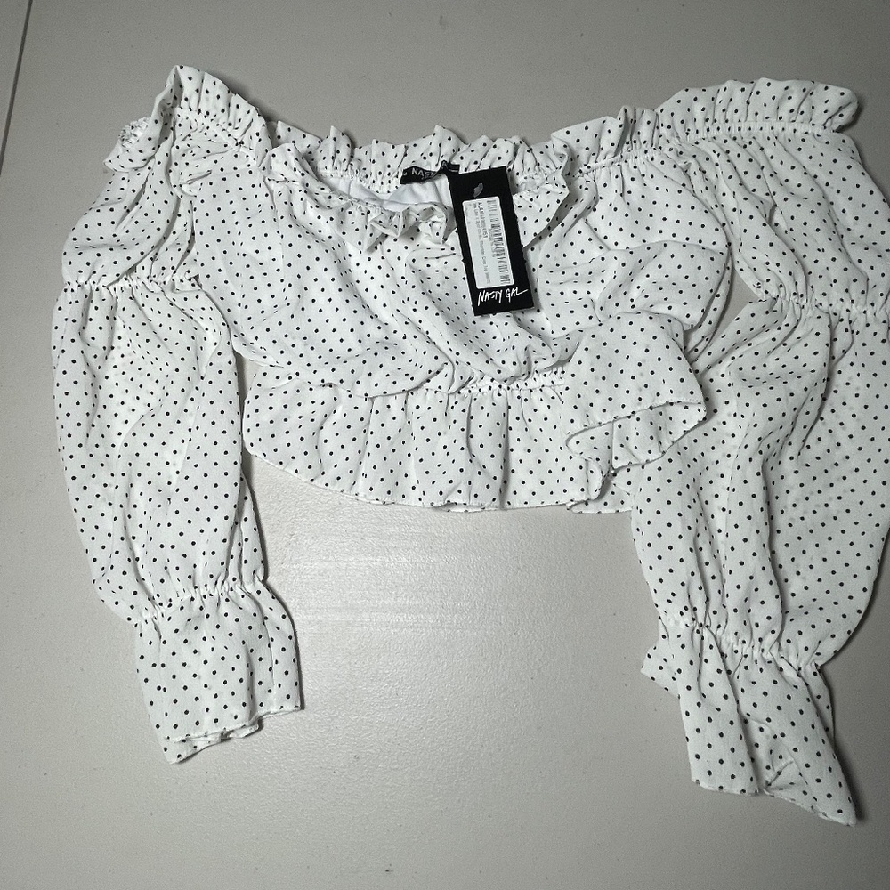 Nasty Gals Women’s Top. Off the shoulder. Flute sleeves. Ruffles. Made in Italy.